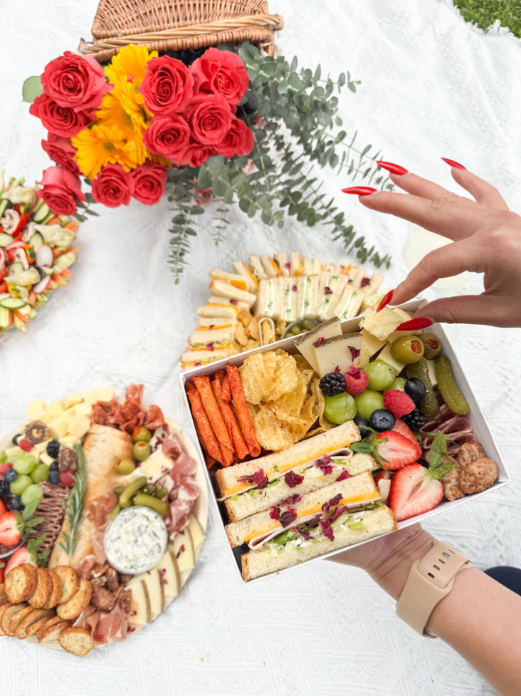 Grazing platter with fresh vegetables, fruit, and charcuterie for corporate catering
